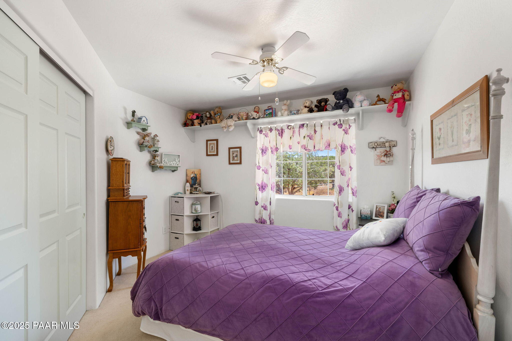 5400 North Skyhawk Road Chino Valley, AZ 86323 - Photo 16 of 26 a bedroom with a large bed and a window