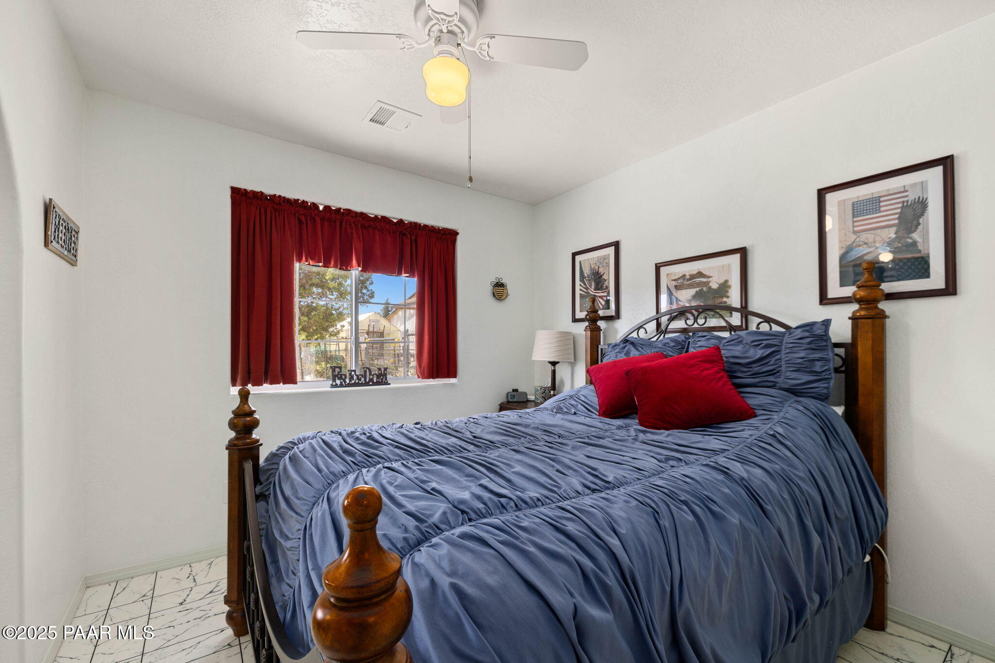 5400 North Skyhawk Road Chino Valley, AZ 86323 - Photo 19 of 26 a bedroom with a bed and window