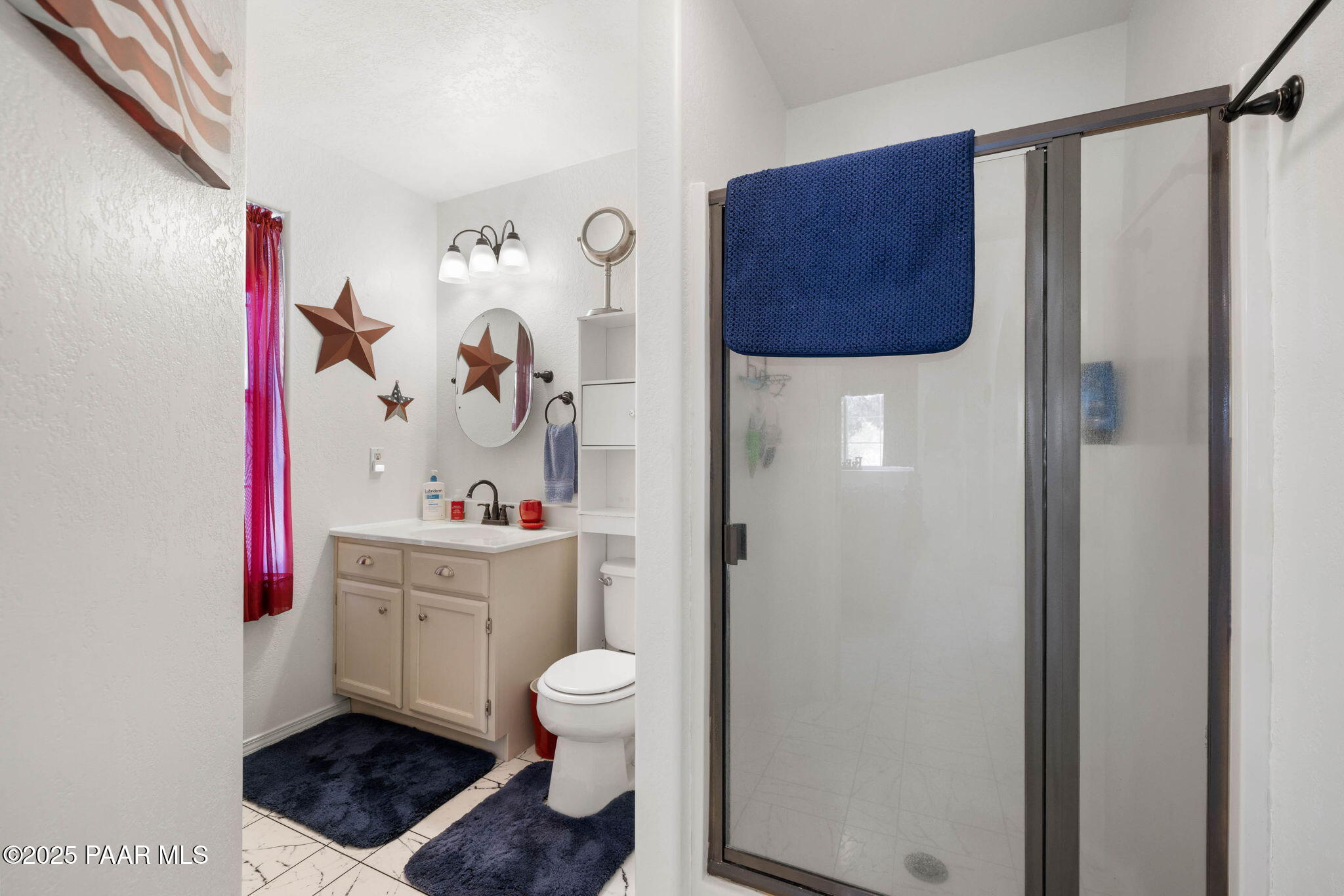 5400 North Skyhawk Road Chino Valley, AZ 86323 - Photo 20 of 26 a bathroom with a toilet a sink and a shower