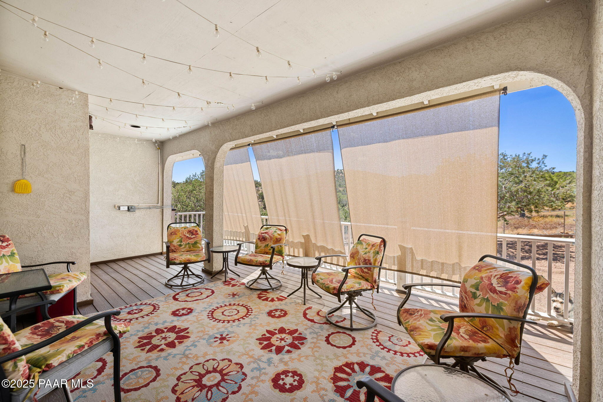 5400 North Skyhawk Road Chino Valley, AZ 86323 - Photo 22 of 26 a living room with furniture and a floor to ceiling window