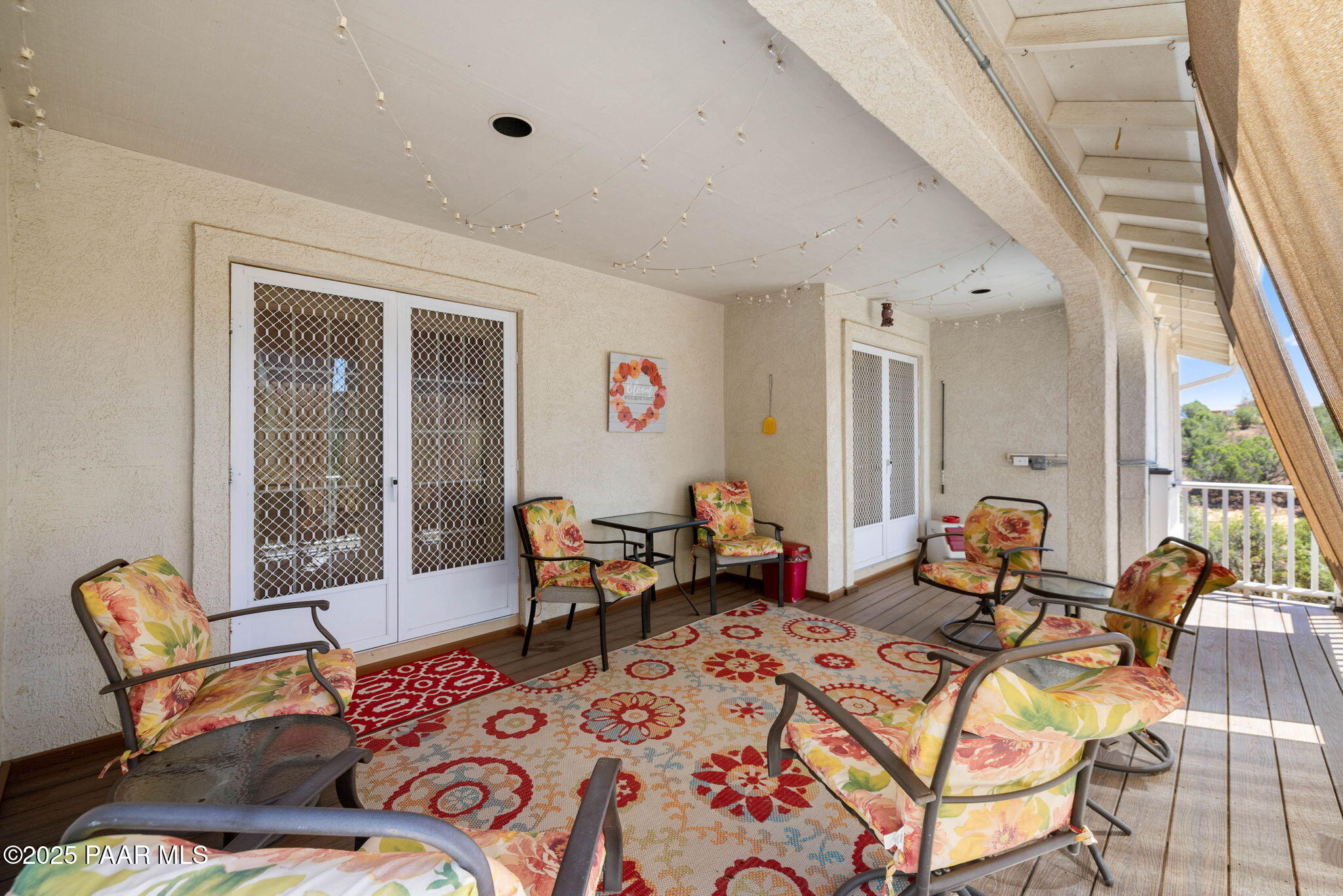 5400 North Skyhawk Road Chino Valley, AZ 86323 - Photo 23 of 26 a living room with furniture and two large window