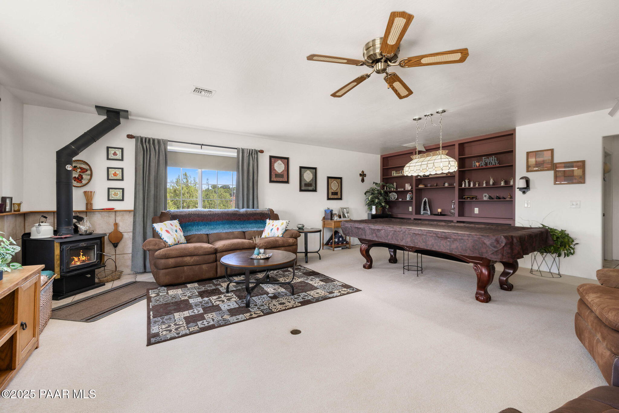 5400 North Skyhawk Road Chino Valley, AZ 86323 - Photo 7 of 26 a living room with furniture and a rug