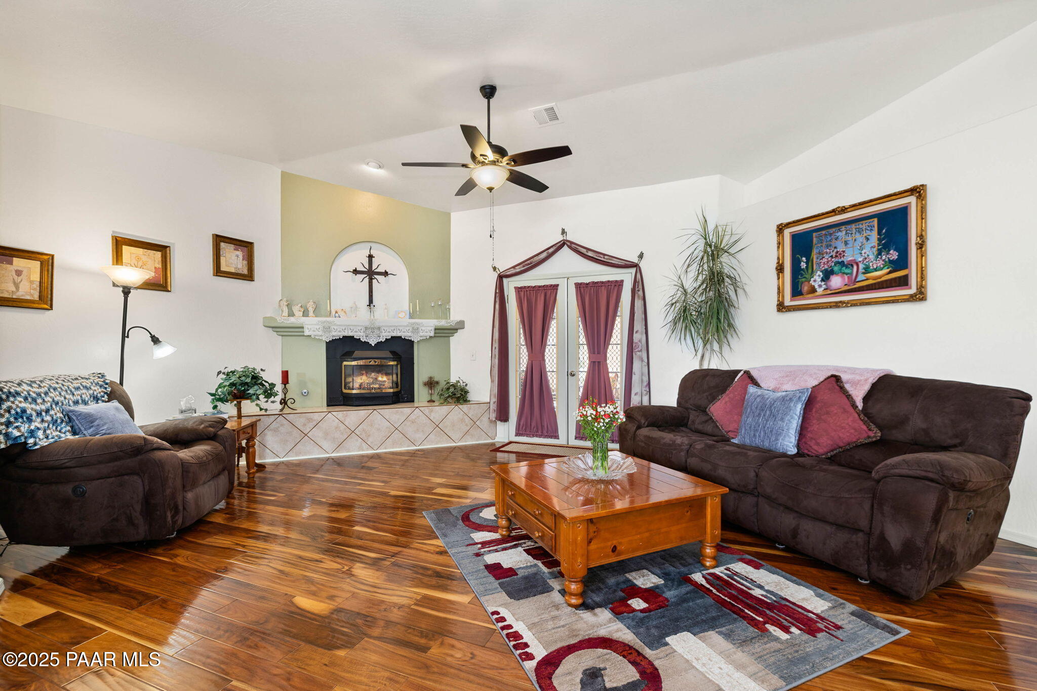 5400 North Skyhawk Road Chino Valley, AZ 86323 - Photo 8 of 26 a living room with furniture and a fireplace