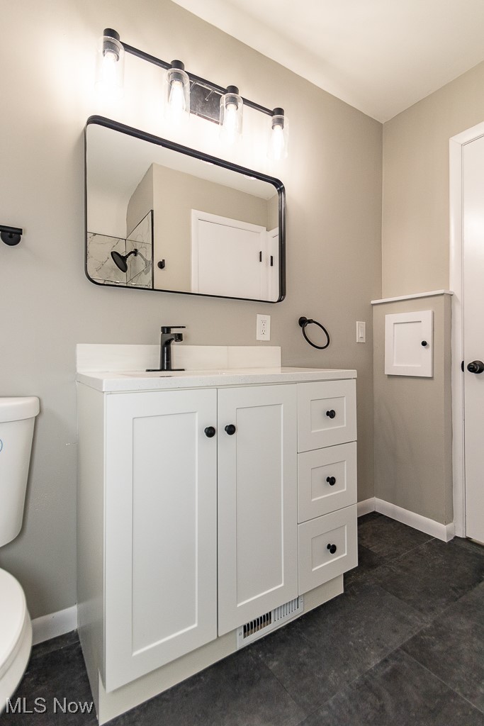 5683 Cherokee Road Cleveland, OH 44124 - Photo 16 of 35 Bathroom with vanity and toilet