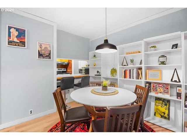 a view of a dining room with furniture
