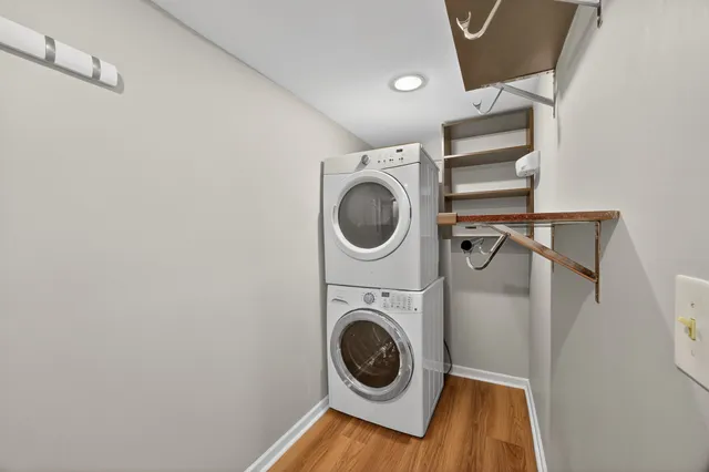 a view of a storage & utility room with dryer and washer