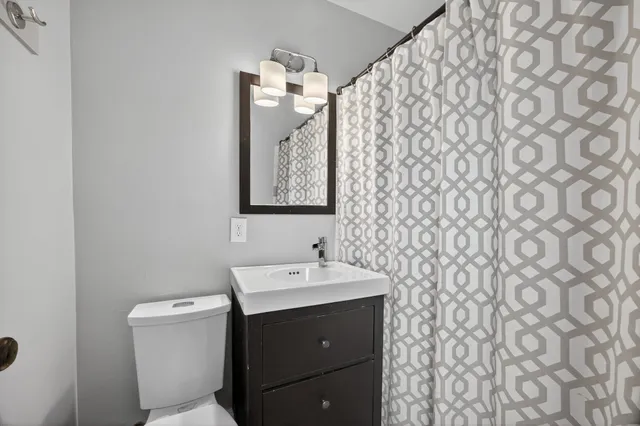 a bathroom with a sink and a toilet