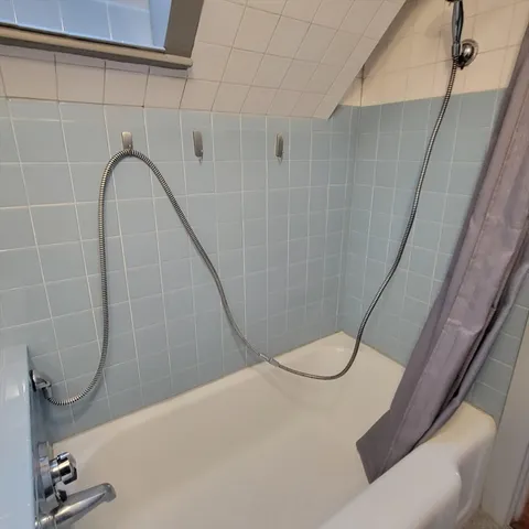 a close view of a shower in a bathroom