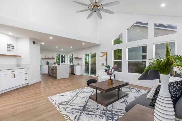 a living room with furniture and a table