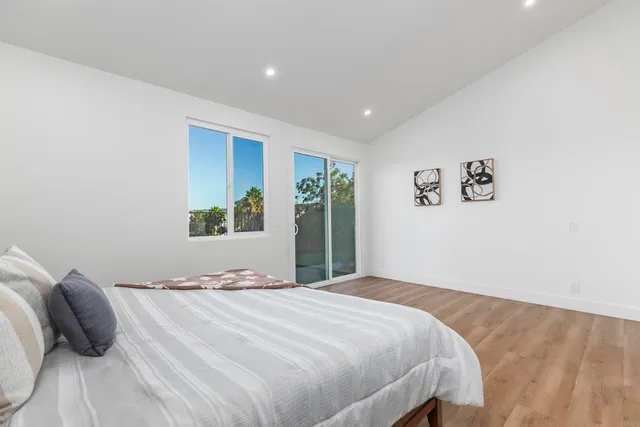 a bathroom with a sink toilet a mirror and tub