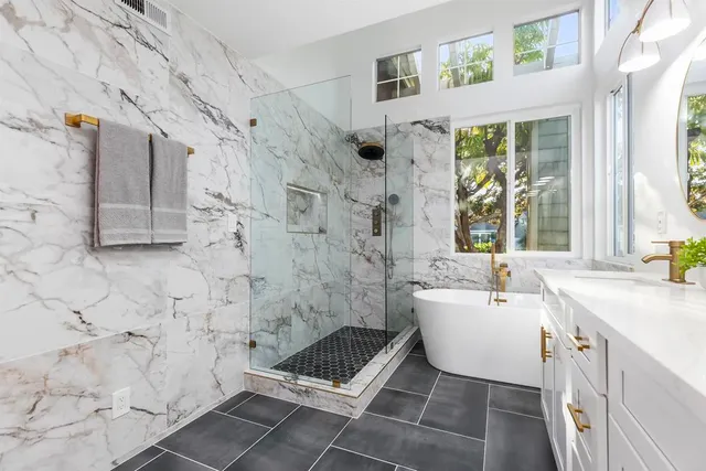 a living room with a sink and a mirror