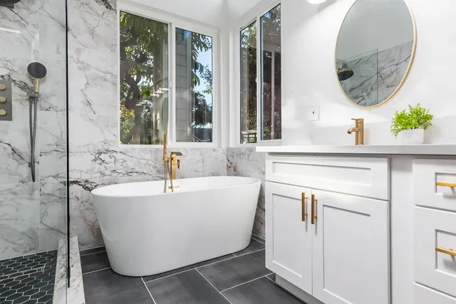a view of a bathroom with wooden floor