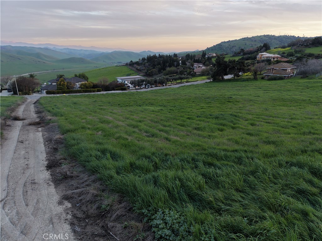 125 High Sierra Drive Exeter, CA 93221 - Photo 11 of 19 a view of grassy field with mountain