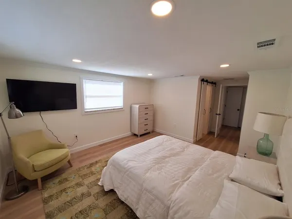 a room with a desk and a window