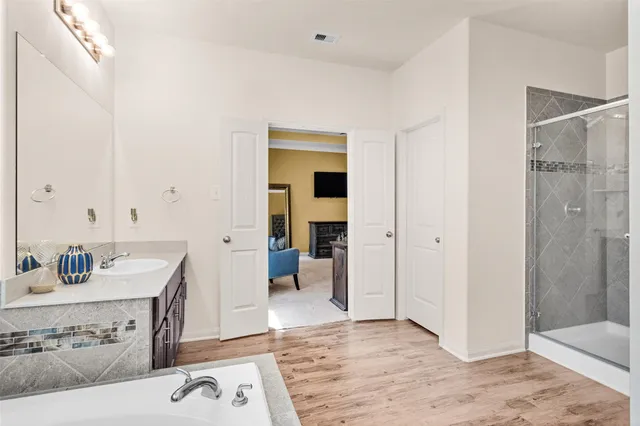 a bathroom with a sink and a mirror