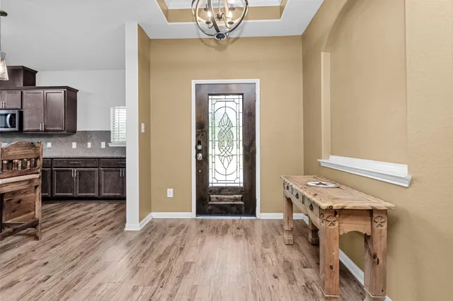 a view of a kitchen cabinets and a stove top oven