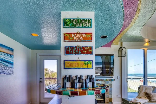 a bathroom with a sink a toilet and a shower curtain