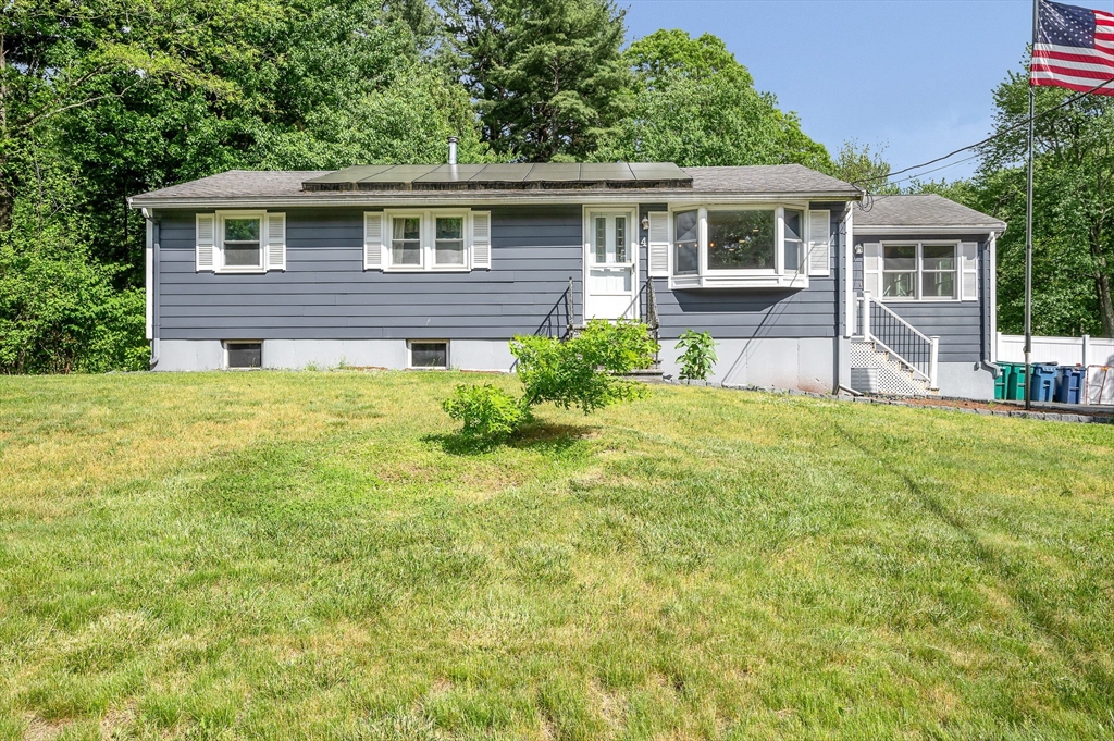 4 Governor Saltonstall Road Billerica, MA 01821 - Photo 1 of 25 a house view with a garden space