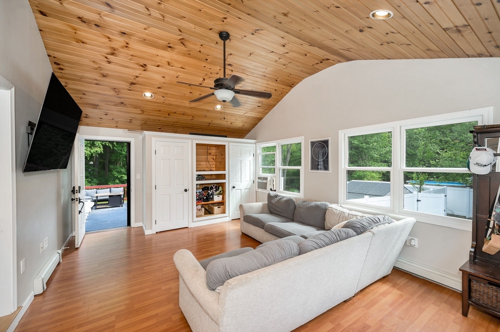 4 Governor Saltonstall Road Billerica, MA 01821 - Photo 2 of 25 a living room with furniture and a large window