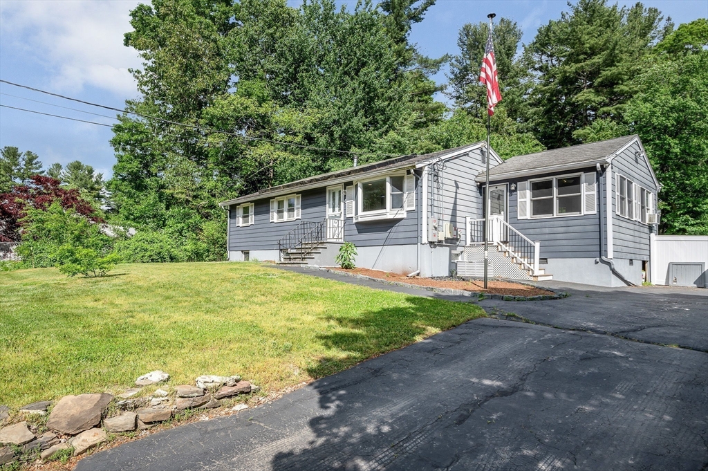 4 Governor Saltonstall Road Billerica, MA 01821 - Photo 22 of 25 a front view of house with yard and green space