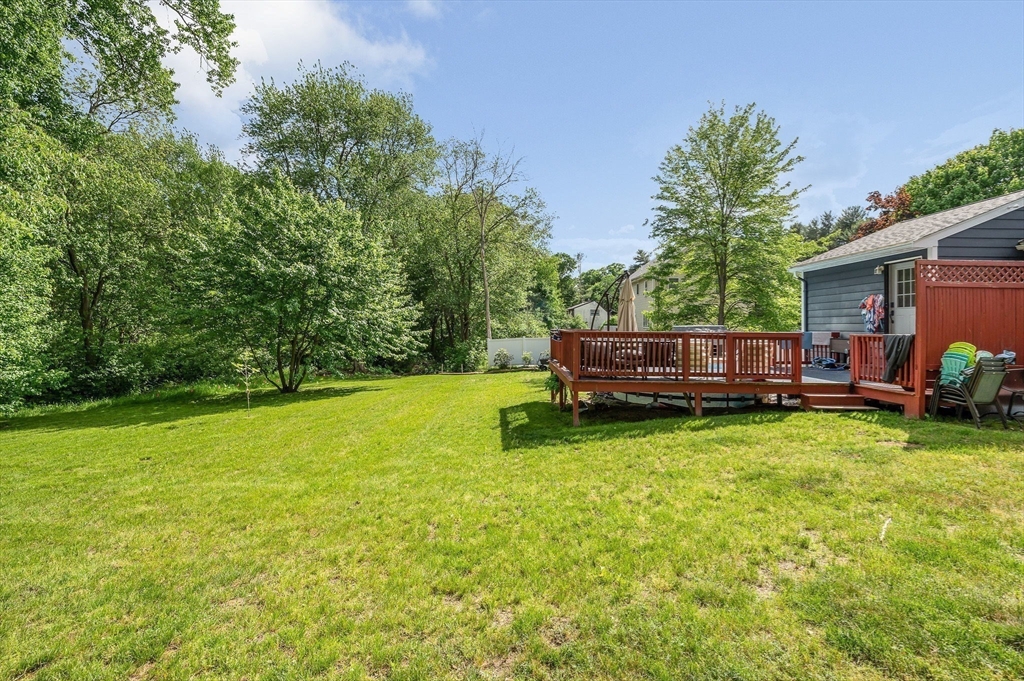 4 Governor Saltonstall Road Billerica, MA 01821 - Photo 24 of 25 a view of back yard with swimming pool outdoor seating and green space