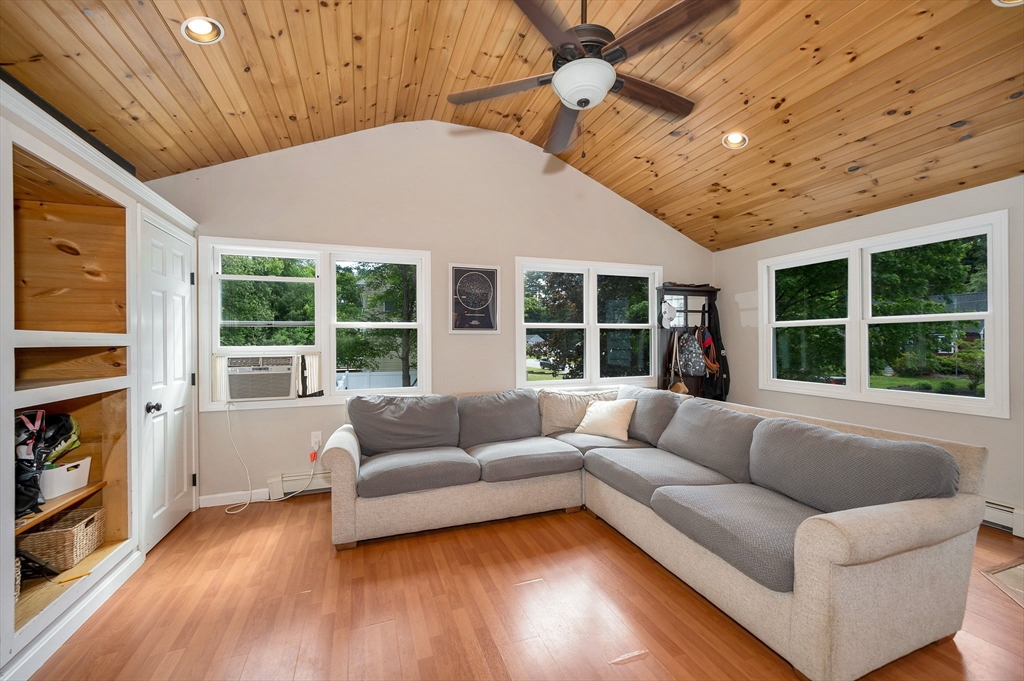 4 Governor Saltonstall Road Billerica, MA 01821 - Photo 3 of 25 a living room with furniture and a large window