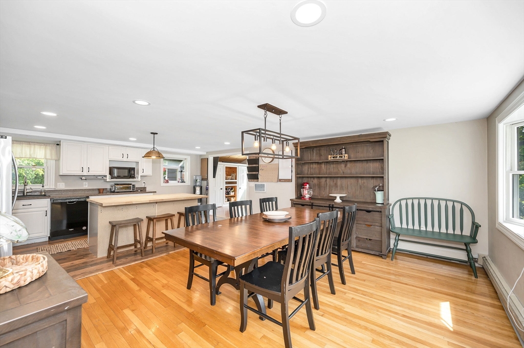 4 Governor Saltonstall Road Billerica, MA 01821 - Photo 8 of 25 a view of a dining room with furniture and wooden floor