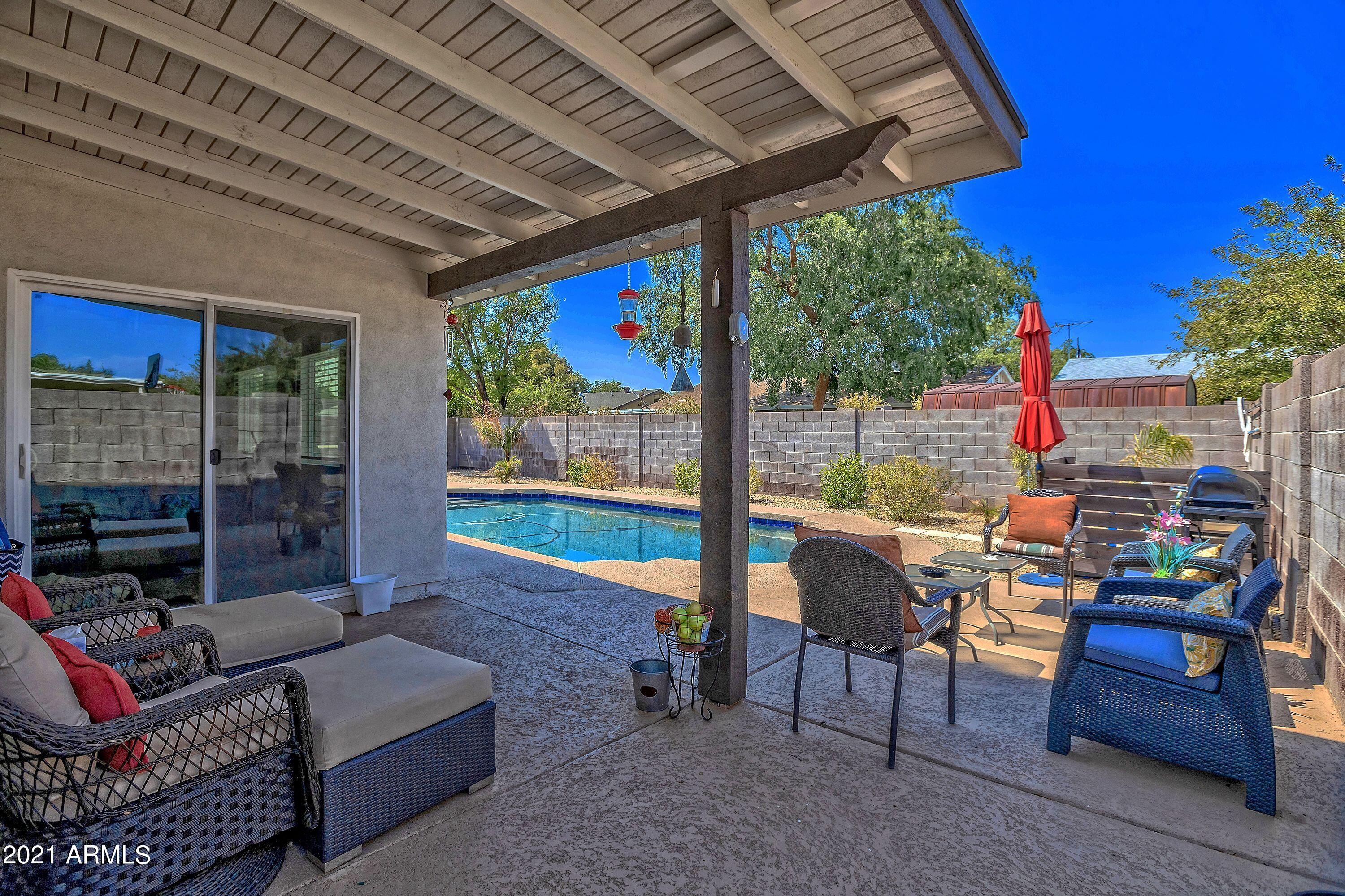 13838 North 37th Way Phoenix, AZ 85032 - Photo 24 of 31 POOL SITTING AREA