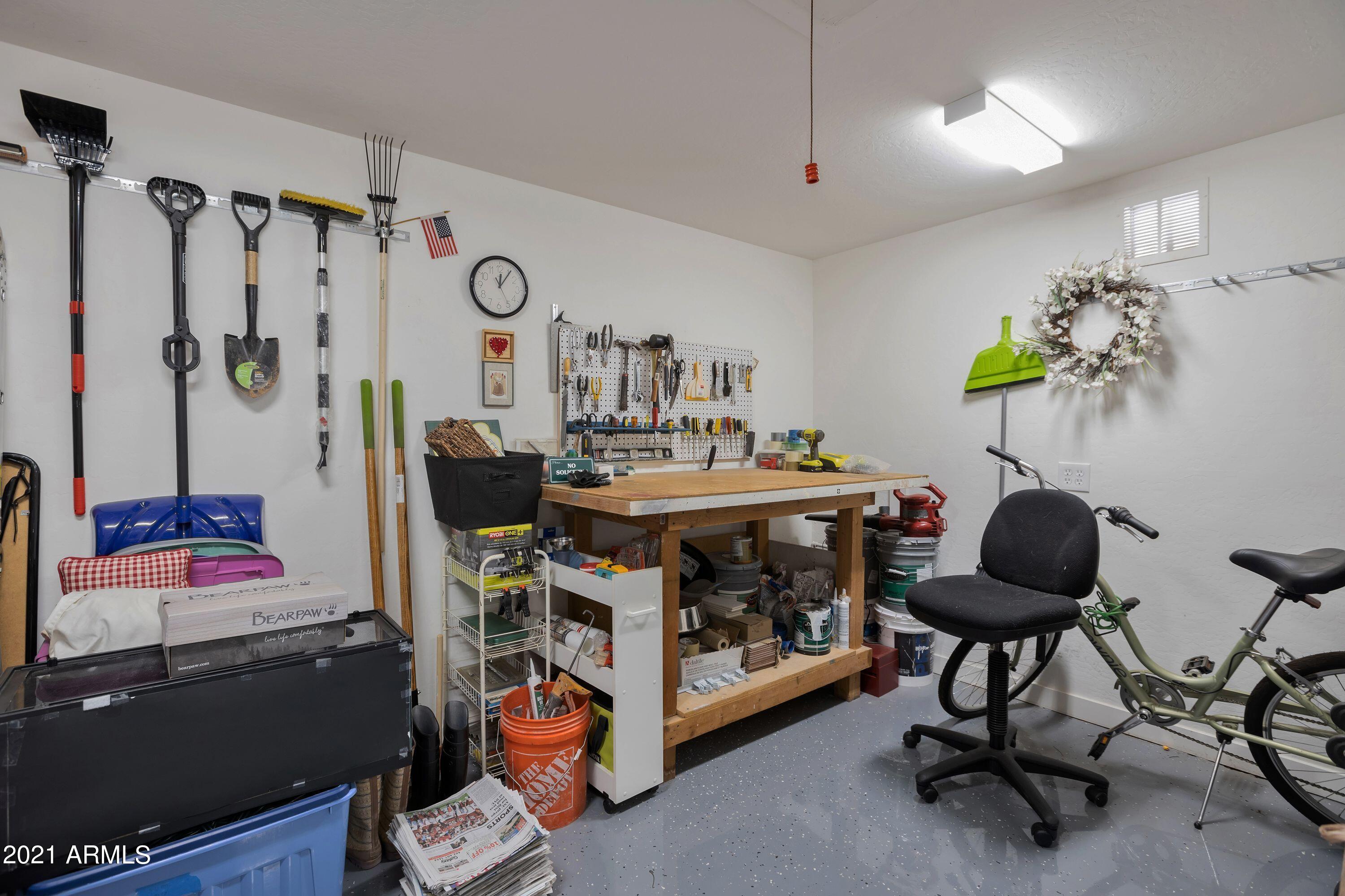 13838 North 37th Way Phoenix, AZ 85032 - Photo 28 of 31 WORKSHOP IN GARAGE