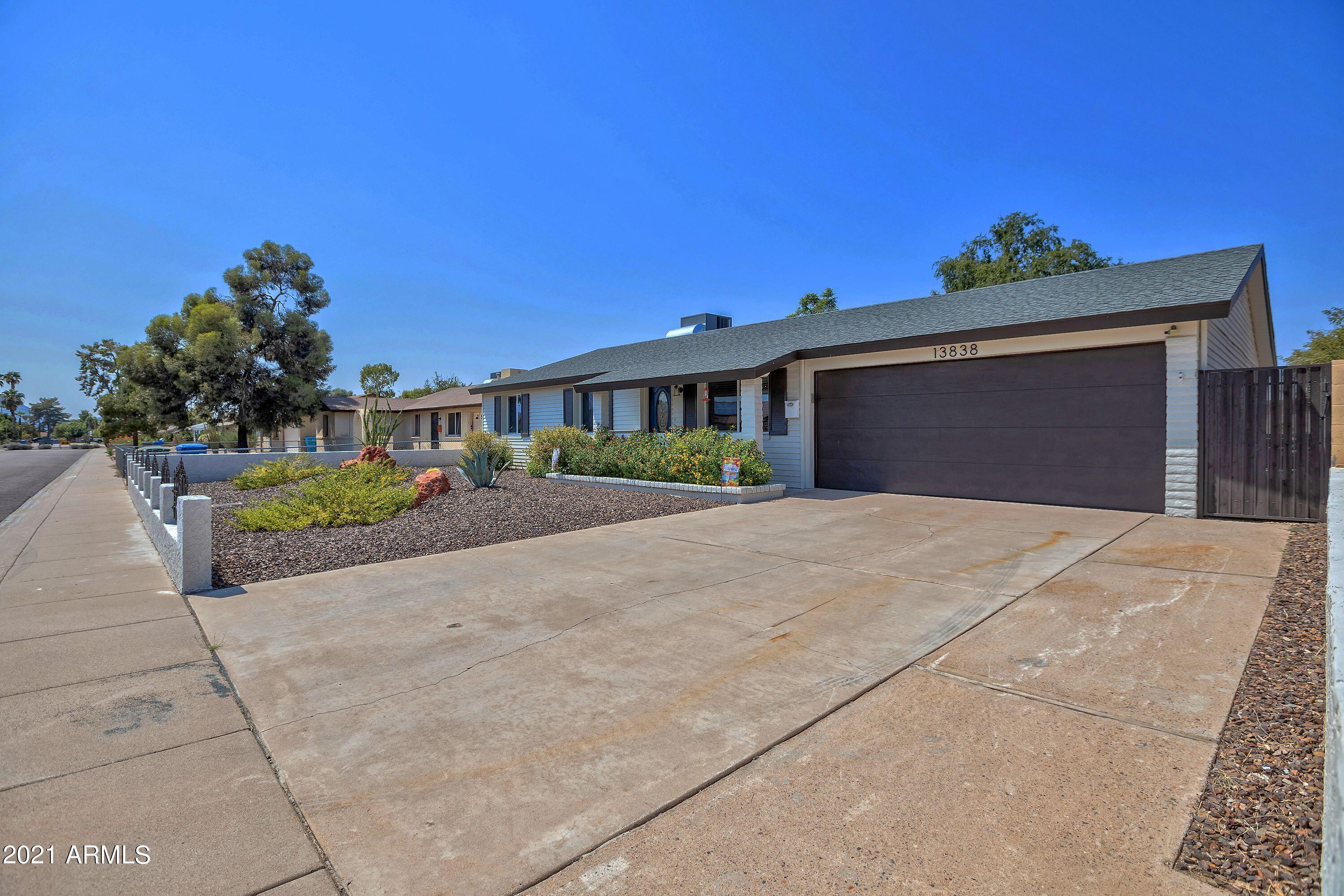13838 North 37th Way Phoenix, AZ 85032 - Photo 3 of 31 FRONT 3