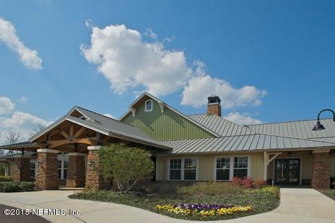 1198 Camp Ridge Lane Middleburg, FL 32068 - Photo 5 of 7 a front view of a house with garden