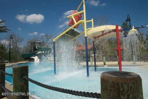1198 Camp Ridge Lane Middleburg, FL 32068 - Photo 7 of 7 a swimming pool with outdoor seating and yard