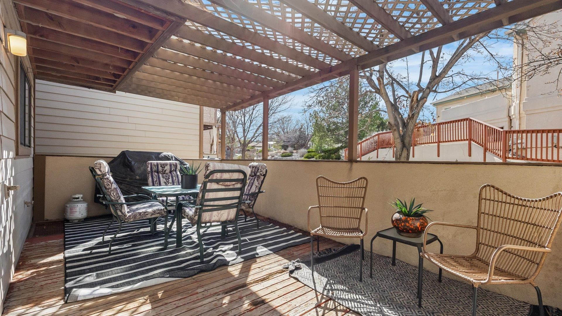 397 Ridge Cir Drive, Unit 3 Grand Junction, CO 81507 - Photo 26 of 28 a roof deck with couch and chairs