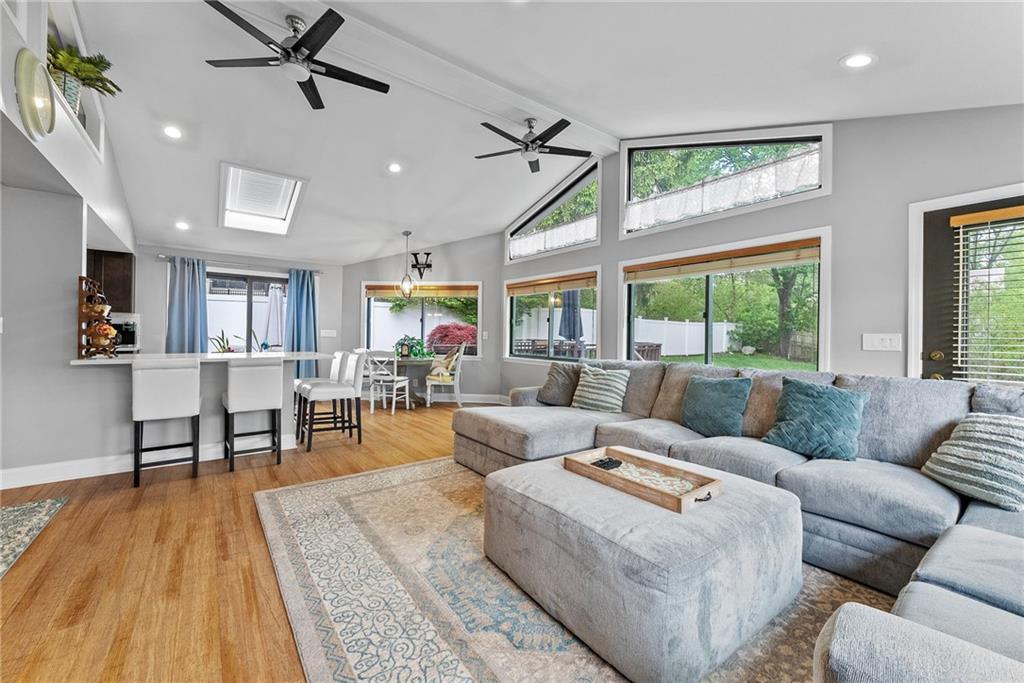 3226 Arapahoe Road Pittsburgh, PA 15241 - Photo 13 of 50 The vaulted ceiling family room has room for everyone, tons of natural light & convenient access to the kitchen!
