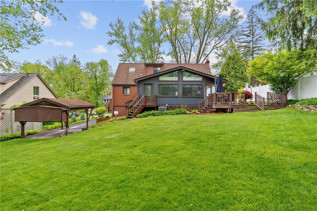 3226 Arapahoe Road Pittsburgh, PA 15241 - Photo 45 of 50 Expansive back yard includes a shed, large deck, brick paver patio, and covered carport on a 1/3 acre lot!