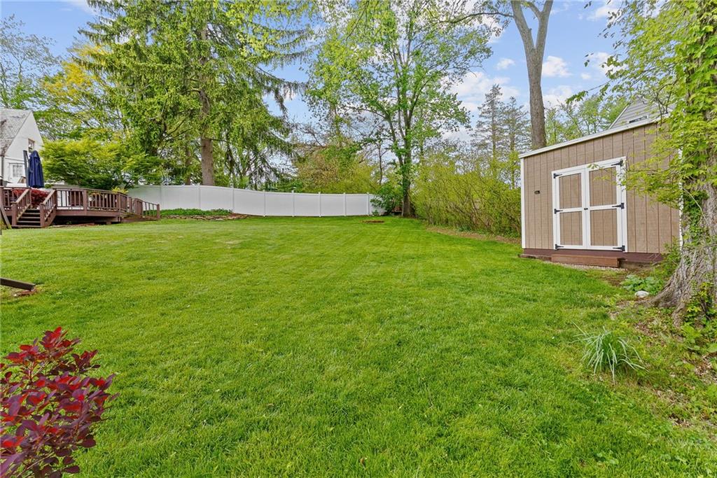 3226 Arapahoe Road Pittsburgh, PA 15241 - Photo 46 of 50 Expansive back yard includes a shed, large deck, brick paver patio, and covered carport on a 1/3 acre lot!