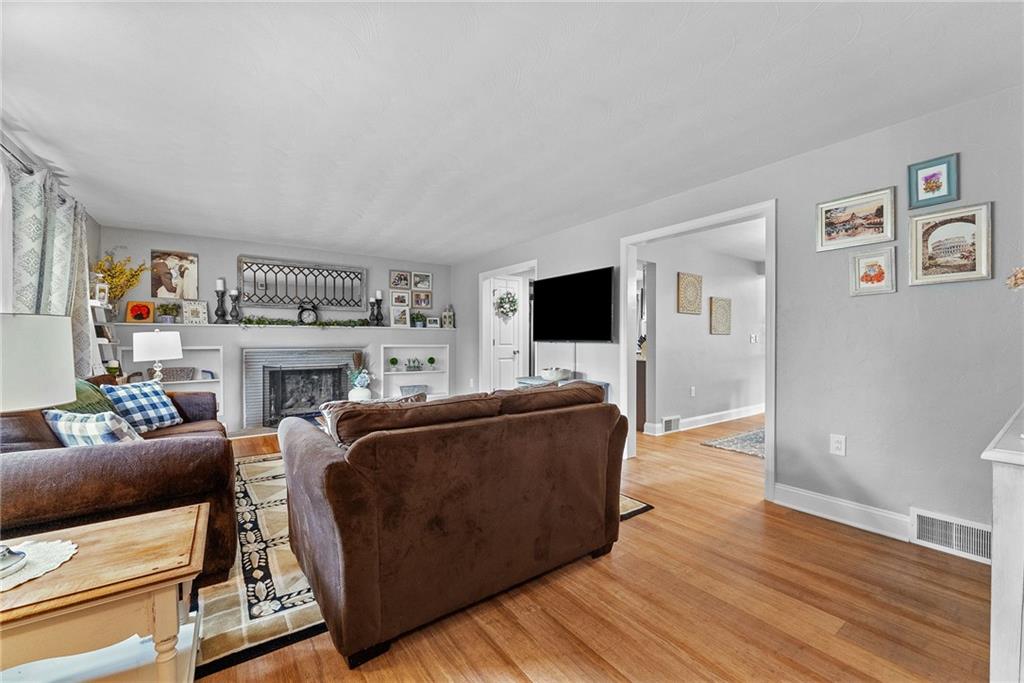 3226 Arapahoe Road Pittsburgh, PA 15241 - Photo 7 of 50 Spacious living room with built ins & a wood burning fireplace!