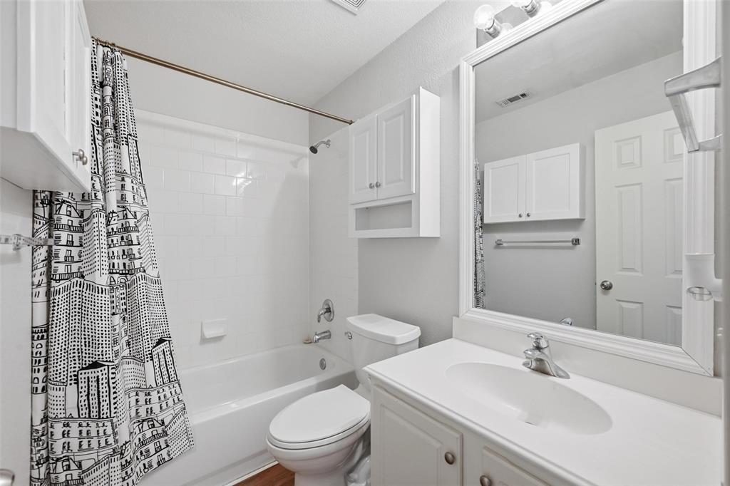 1020 Hay Stack Court Little Elm, TX 75068 - Photo 16 of 20 a bathroom with a sink toilet tub and shower