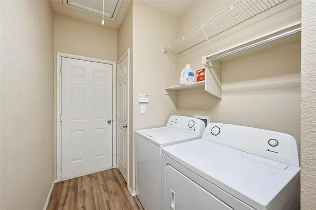 a utility room with dryer and washer