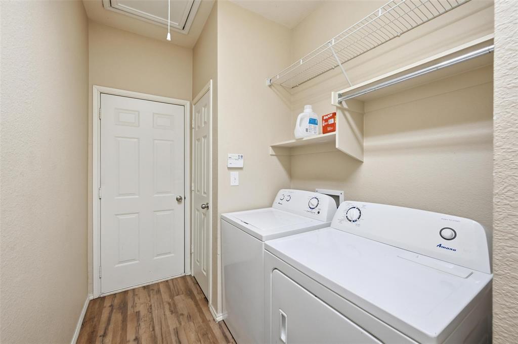 1020 Hay Stack Court Little Elm, TX 75068 - Photo 17 of 20 a utility room with dryer and washer