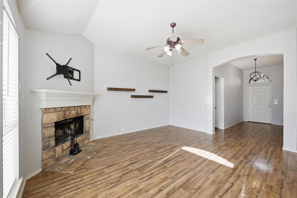 1020 Hay Stack Court Little Elm, TX 75068 - Photo 3 of 20 a view of a livingroom with a fireplace