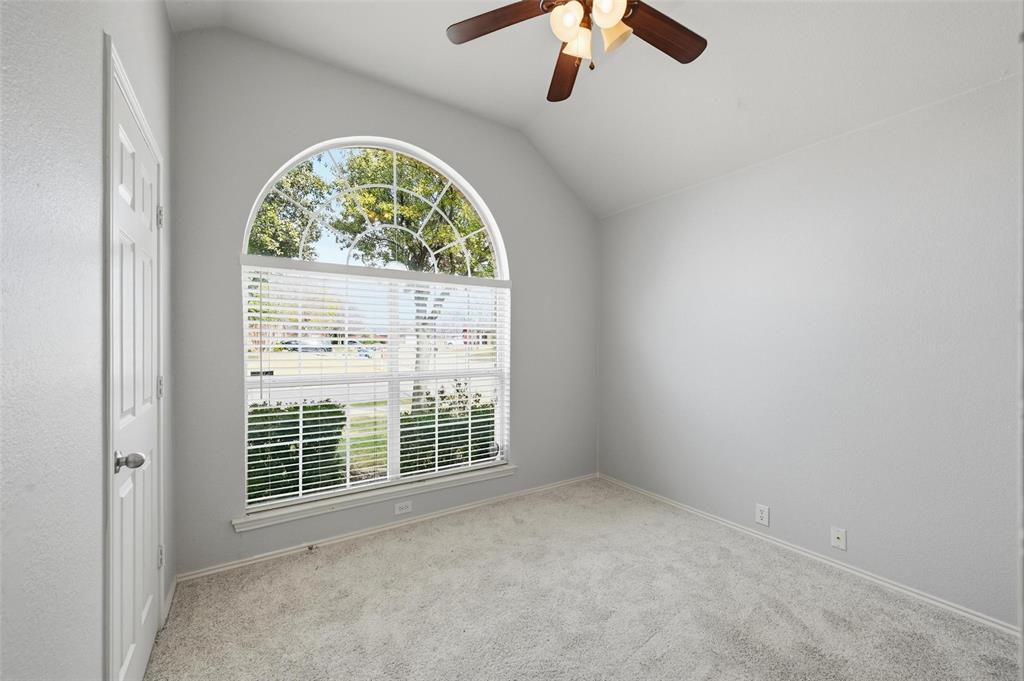 1020 Hay Stack Court Little Elm, TX 75068 - Photo 10 of 20 an empty room with a window