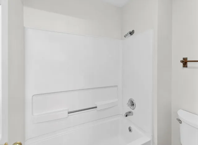 a view of small space with racks on the wall