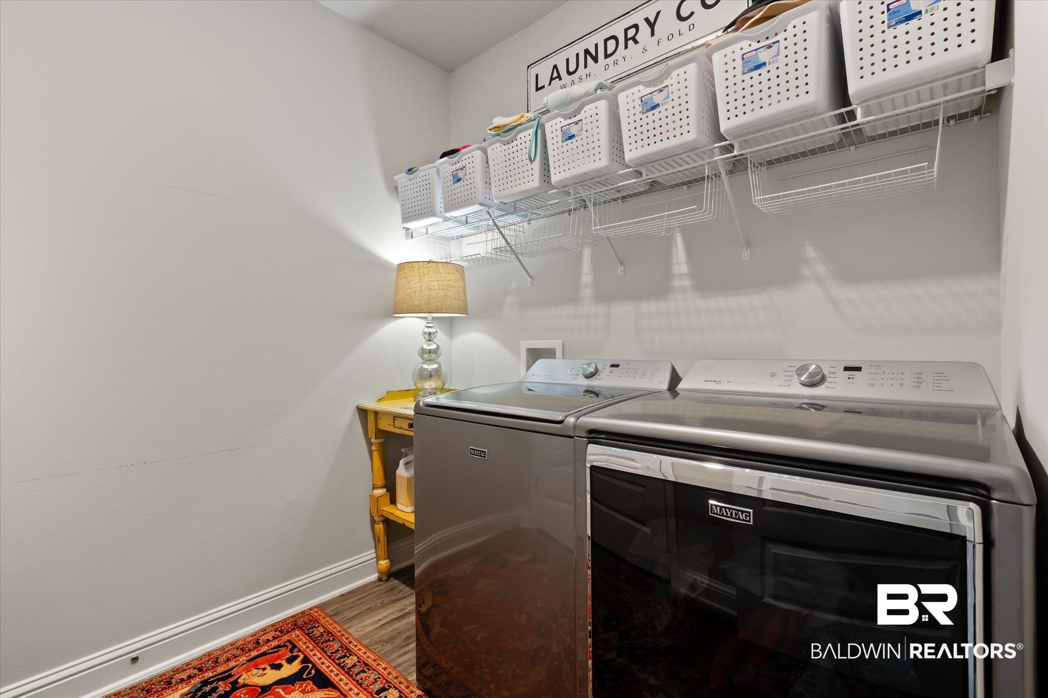 12899 Sanderling Loop Daphne, AL 36527 - Photo 27 of 28 Washroom featuring hardwood / wood-style floors and washing machine and dryer