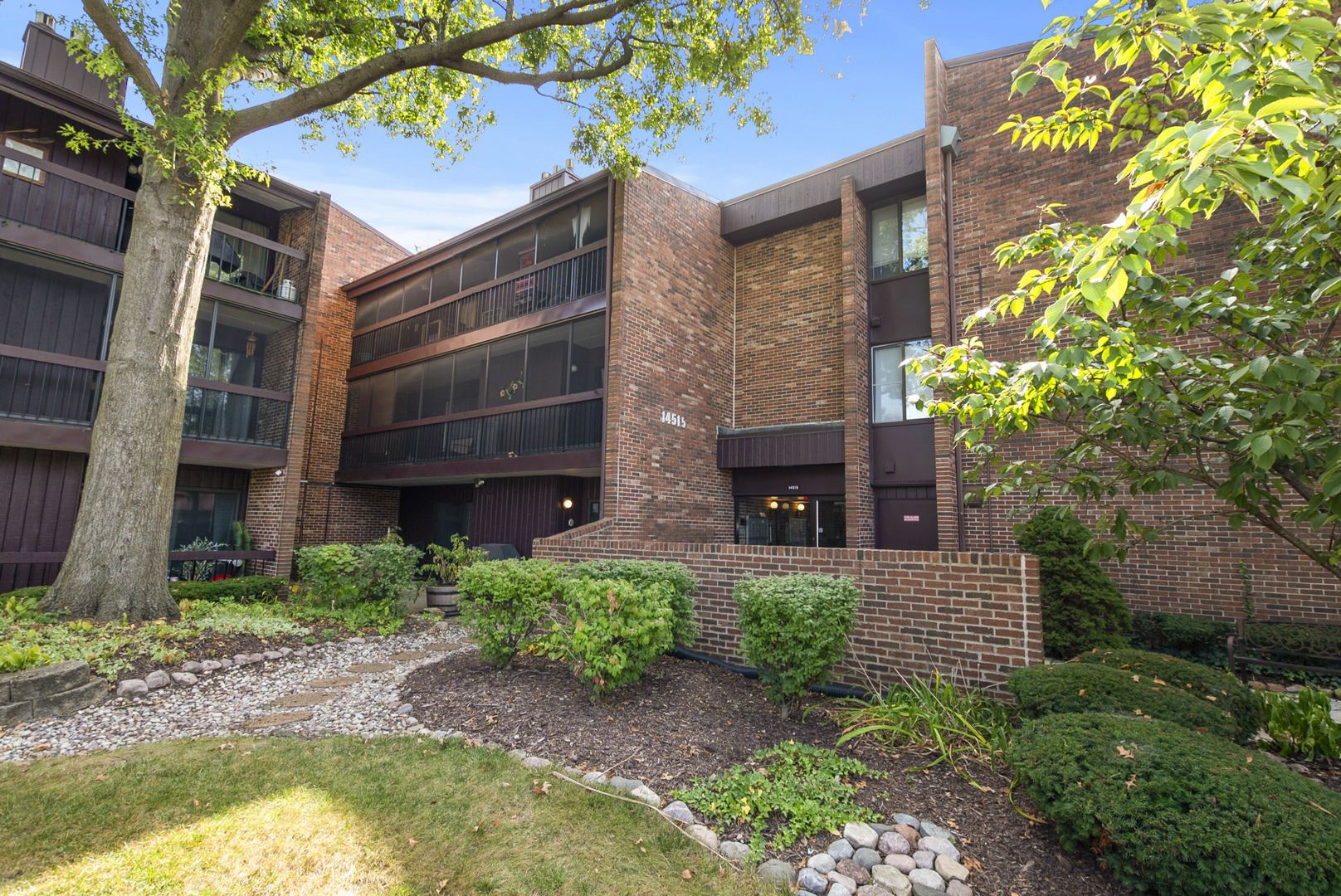 a view of a pathway both side of house