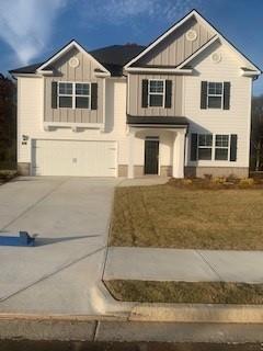 328 Bullock Pass Jefferson, GA 30549 - Photo 1 of 23 a front view of a house with a yard