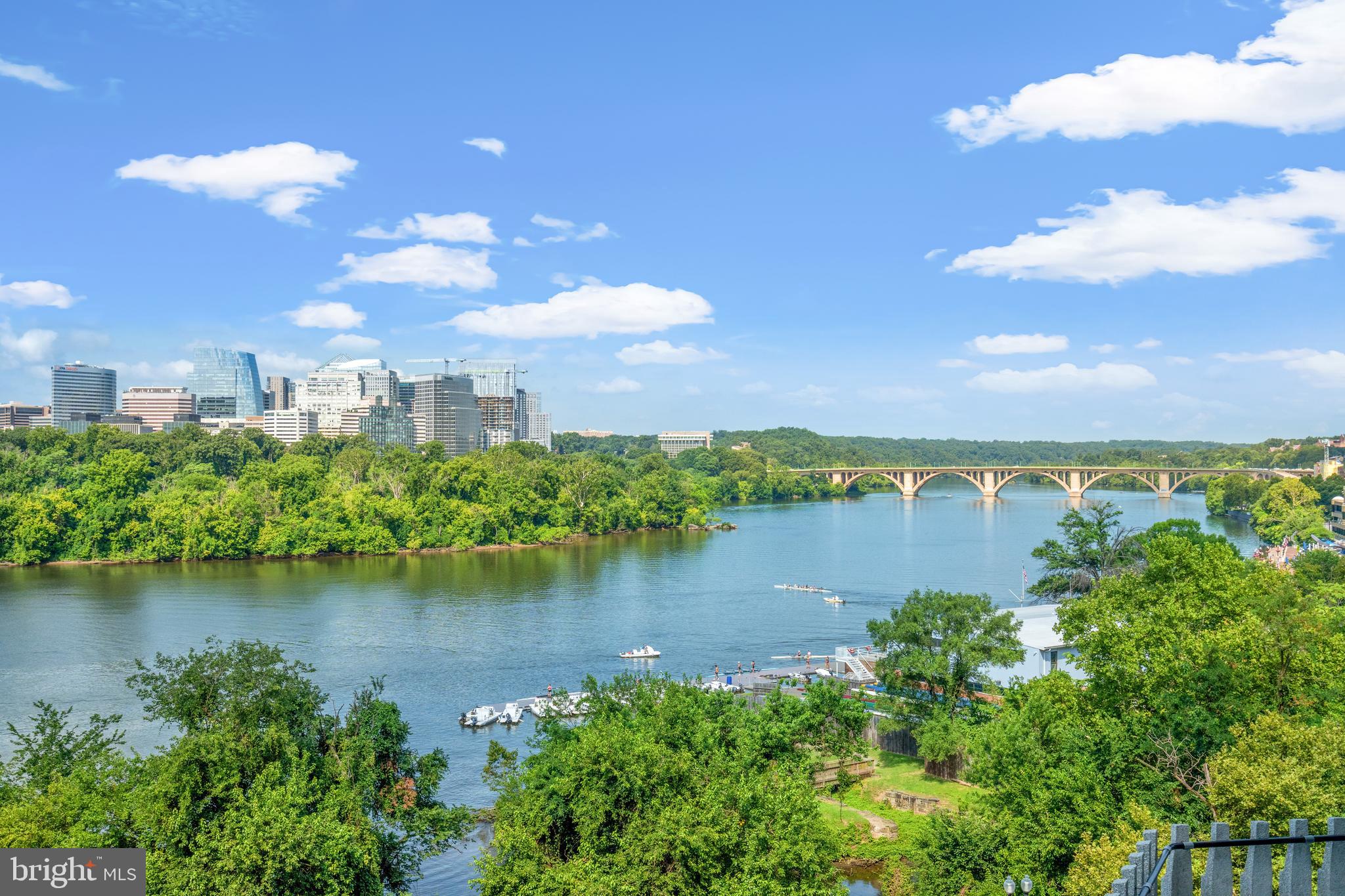 a view of a lake with a city