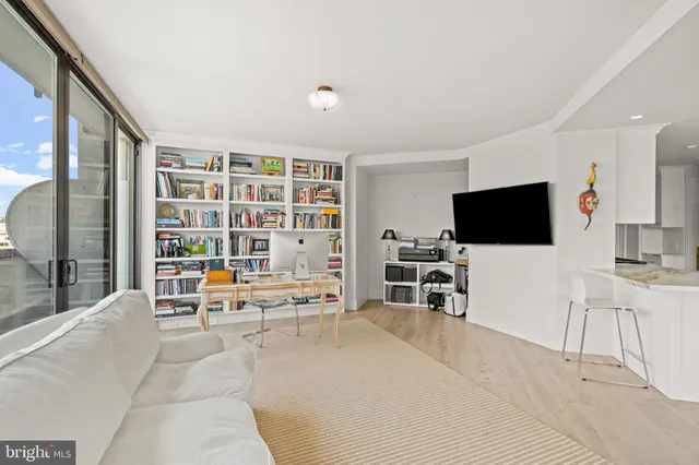 a kitchen with stainless steel appliances granite countertop a sink and a stove top oven