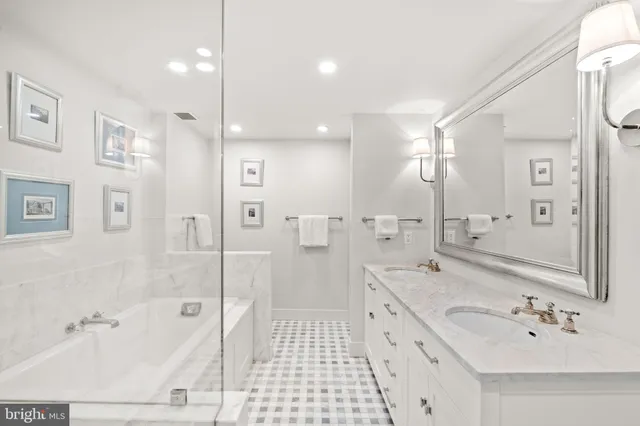 a bedroom with a bed and a lamp with window