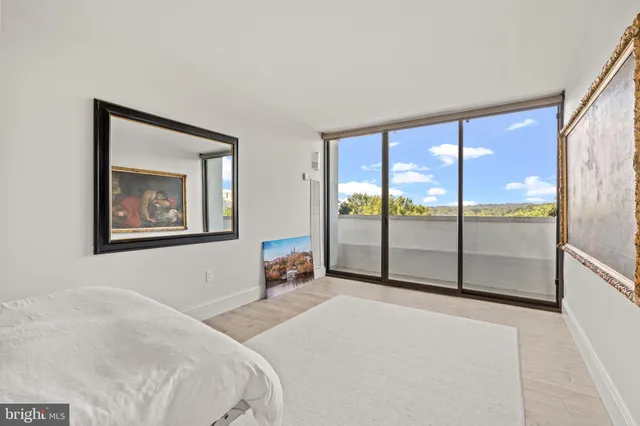 a bathroom with a sink toilet a mirror and shower